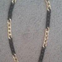 زنجیر کارتیر مشکی طلایی