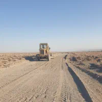 راننده گریدر و غلطک