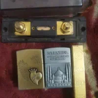 تعدادی فندک گازی و خا. زن 150 آمپر کارینا