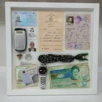 تابلو یادگاری بود اویز با عکس گردن بند با خاک