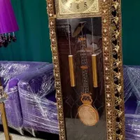 ساعت قدی طلایی
