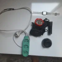 ساعت و چراغ قوه