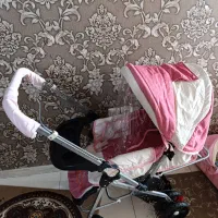 کالسکه و ساک حمل نوزاد