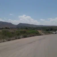 زمین به سمته پمپ بنزین اول جاده ۳۳پل