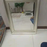 اینه با قاب چوبی