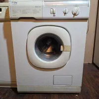 لباس شویی پاکشوما