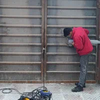 نصب، فروش و تعمیر جک کرکره درب اوپراتور راهبند