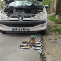 برق خودرو(باطری فروشی)وشارژ گاز کولر