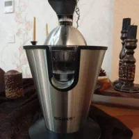 آب پرتقال گیر برقی