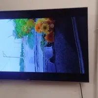 تلویزیون ۴۳ ال ای دی و میز تلویزیون