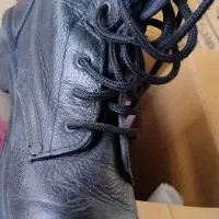 پوتین خدمت چرم