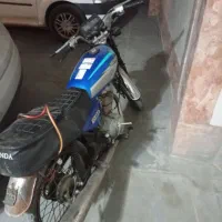 موتور ۱۲۵ مزایده