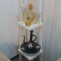 استند همراه با وسیله