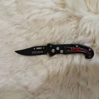 چاقوی ضامن دار