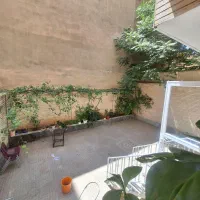 فروش آپارتمان ۱۰۵ متری حیاط دار *ولیعصر*رودکی
