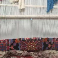 فرش دست بافت نصف بافته با داروکول .و پشم اندازه..
