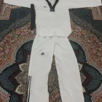 لباس تکواندو همراه با کمربند مشکی