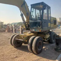 بیل مکانیکی لاستیکی HE100B