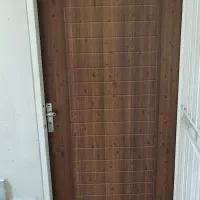 درب ورودی چوبی با حفاظ اهنی