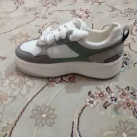 کفش|کیف، کفش، کمربند|قم, قلعه یزدیها|دیوار