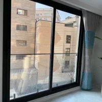 دو عدد پنجره آلومینیومی با شیشه و یراق