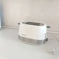 توستر نان میگل