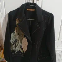 تعدادی مانتو فروش