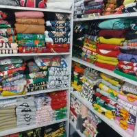 پوشاک بچگانه زیر قیمت خرید