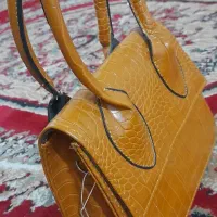 آبادان|کیف، کفش، کمربند|آبادان, |دیوار