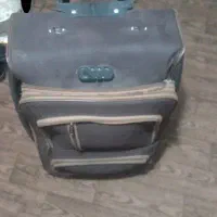 چمدان مسافرتی|کیف، کفش، کمربند|رشت, دروازه لاکان|دیوار