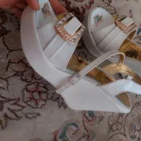 کفش مجلسی|کیف، کفش، کمربند|نیشابور, راه آهن|دیوار