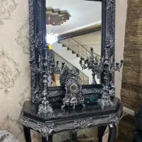 آینه کنسول به همراه ساعت رومیزی و دو عدد شمعدان