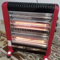 بخاری برقی شوفاژی بامخزن اب۴شعله وفن پرتاب بادقوی