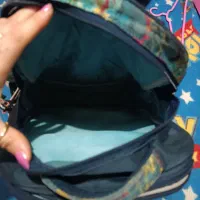 کوله پشتی چراغ دار مدرسه|کیف، کفش، کمربند|رشت, کوی قدس|دیوار