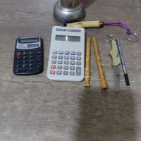 ماشین حساب وخودکار چوبی قدیمی