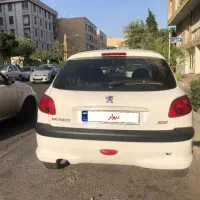 206 تیپ 2 مدل 1400 سفید بیرنگ