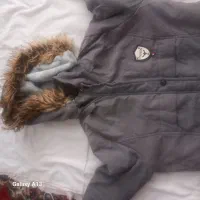 کاپشن|لباس|بیرجند, |دیوار