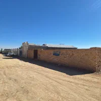 زمین ۴۰۰ متری چهار دیواری سند تک برگ جنب اردوگاه