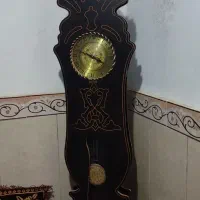 میز تلویزیون ساعت ایستاده ‌. آینه شمعدان. سنگ