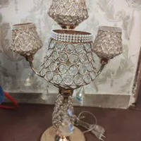 یه جفت شمعدان طلایی رنگ ثابت
