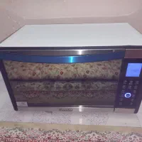 آون توستر کومتای