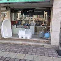 فروش و تهاتر دو باب مغازه در خیابان معلم