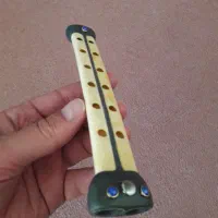 ساز دوزله استخوانی|سازهای بادی|کرمانشاه, |دیوار