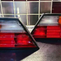 چراغ خطر عقب کامل بنز W124 برند هلا المان