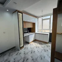 ۵۶ متر / طبقه اول / تراورتن/ پکیج کولرگازی