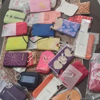 ماکت گوشی وکیف گردنی عینک وموبایل کوچک و باتری