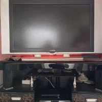 تلویزیون ایکس ویژن با میزش