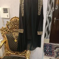 تعدادی مانتو و لباس مجلسی