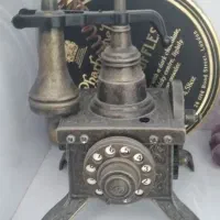 فندک برنجی کوچیک شبیه تلفن قدیمی کلکسیونی