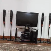 سینما خانواده به همراه میز تلویزیون